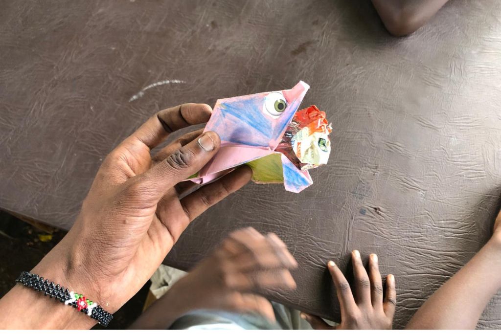 The Origami fish models were made by kids of an informal ocean club in a local community in Kenya.