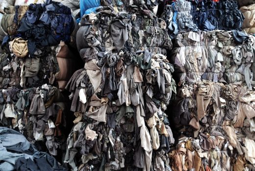 Thrown away clothes; fast fashion waste.